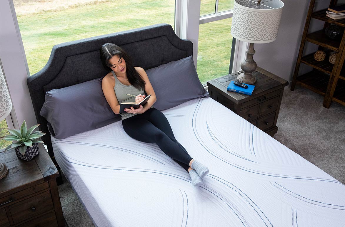 woman sitting on v3 verlo mattress